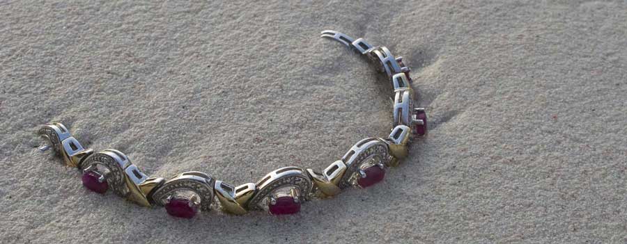 a bracelet lost in the sand